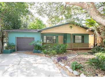 Charming bungalow with a cozy front porch and a well-maintained yard at 1502 E Gore St, Orlando, FL 32806