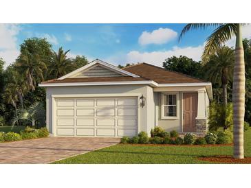 Charming single-story home featuring a garage, landscaped yard, and a welcoming entryway at 3975 Kennebunk Loop, Mount Dora, FL 32757