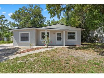 Charming single-story home featuring a well-maintained yard and neutral exterior paint at 614 Plum Ln, Altamonte Springs, FL 32701
