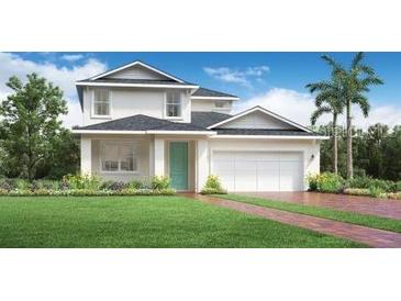 Beautiful two-story home featuring a manicured lawn, two-car garage, and well-maintained landscaping at 2772 Golden Barrel A Ave, Apopka, FL 32712