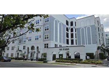 Beautiful building featuring an elegant entrance, and white and gray color scheme at 204 E South St # 4056, Orlando, FL 32801
