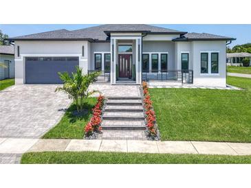 Beautiful home showcasing a landscaped front yard and decorative walkway leading to the front door at 601 Green Briar Blvd, Altamonte Springs, FL 32714