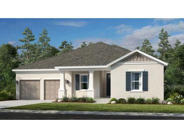 Charming one-story home with a two-car garage, well manicured lawn, and inviting front porch at 16041 Honey Harvest St, Winter Garden, FL 34787