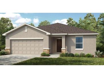 Charming single-story home featuring a neutral color palette, attached garage, and well-maintained front lawn at 4742 Yellow Elder Way, Kissimmee, FL 34758
