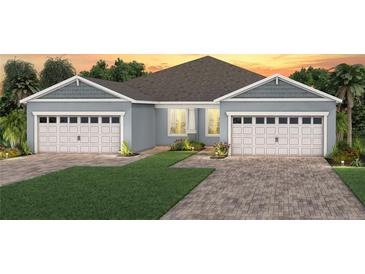 Charming single-story home features a two-car garage, brick driveway, and professional landscaping at 13551 Pearl Beach St, Winter Garden, FL 34787