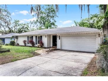 Charming one-story home with a well-maintained lawn and inviting curb appeal at 2666 Derbyshire Rd, Maitland, FL 32751