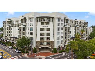 Upscale, modern condominium building with manicured landscaping and prime street corner location at 2305 Edgewater Dr # 1613, Orlando, FL 32804