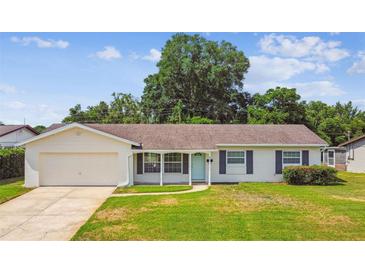 Charming single story home with a well-manicured lawn, attached garage and pleasing curb appeal at 620 Marshall St, Altamonte Springs, FL 32701