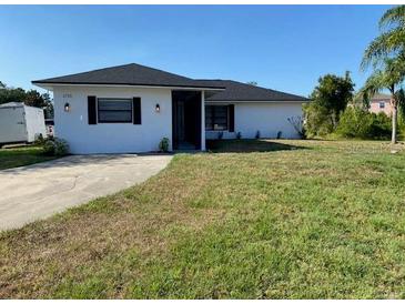 Charming single-story home with a well-maintained lawn and inviting curb appeal at 1750 Mitten Ter, Deltona, FL 32738