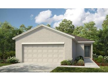 Charming single-story home featuring a large two-car garage and neutral color palette at 483 Wayland Dr, Haines City, FL 33844