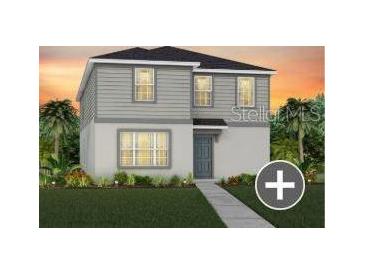 Charming two-story home with a well-manicured lawn and inviting entryway at 7262 Summer Ivy Aly, Orlando, FL 32829
