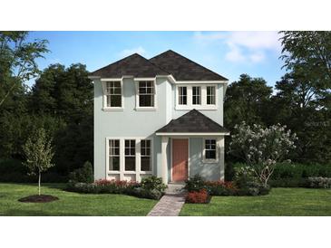 Charming two-story home with a well-maintained lawn and landscaping at 446 Scotsmans Pl, Debary, FL 32713
