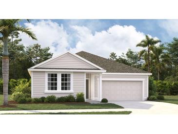 Charming single-story home featuring a well-manicured lawn and attached garage at 2379 Broadbrook Drive, St Cloud, FL 34771