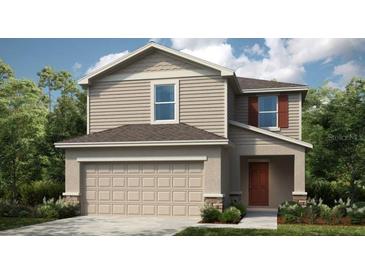 Charming two-story home featuring a neutral color palette and an attached two car garage at 661 Teviot Rd, Haines City, FL 33844