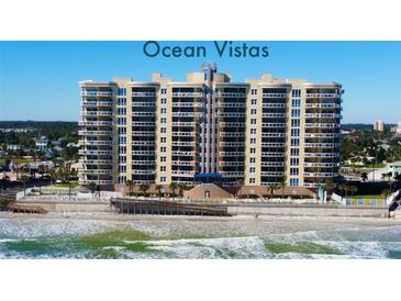 A beachfront building with a beautiful architecture on a sunny day near the beach with ocean waves at 1925 S Atlantic Ave # 411, Daytona Beach, FL 32118
