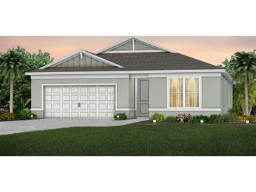 Charming single-Gathering home with a two-car garage, manicured lawn, and beautiful landscaping at 1553 Groveline Rd, St Cloud, FL 34771