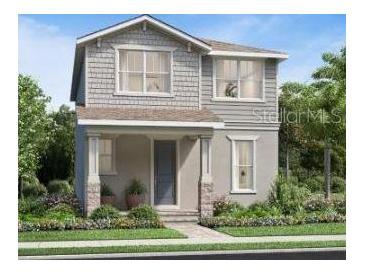 Charming two-story home featuring a covered porch, neutral color palette, manicured lawn, and lush landscaping at 2547 Long Pine Ave, Apopka, FL 32712
