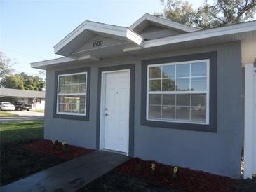 Charming home featuring a new landscape design, updated windows, and a freshly painted exterior at 1600 Roosevelt Ave, Orlando, FL 32804