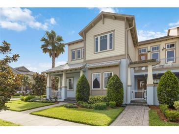 Charming two-story home featuring a well-manicured lawn, inviting front porch, and attractive architectural details at 13755 Benavente Ave, Orlando, FL 32827