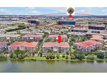 Stunning aerial view of a multi-Gathering dwelling near a lake and Epic Universe in Orlando, Florida at 5024 Shoreway Loop # 10106, Orlando, FL 32819
