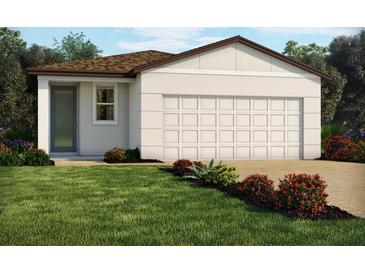 Charming single-story home featuring a two-car garage and a well-manicured lawn with colorful landscaping at 3678 Portsmouth Ln, Haines City, FL 33844