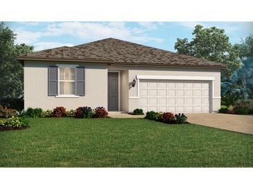 Charming single-story home features a well-manicured lawn, beautiful landscaping, and a two-car garage at 3132 Legends Preserve Dr, Daytona Beach, FL 32124