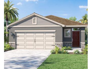 Charming single-story home with a neutral color scheme and well-manicured landscaping at 5718 Somerset Dr, Haines City, FL 33844