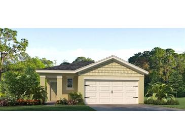 Charming single-story home featuring a two-car garage, neutral-colored facade, and a beautifully landscaped front yard at 2816 Swooping Sparrow Dr, St Cloud, FL 34773