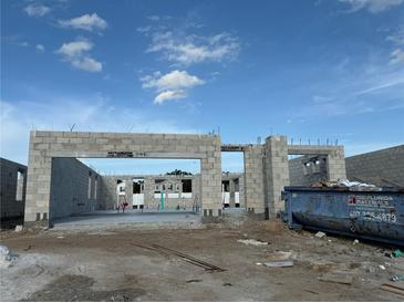 New home's concrete block framework showcases the property's structure, revealing its future layout and potential at 821 River Stone Trl, Sanford, FL 32771