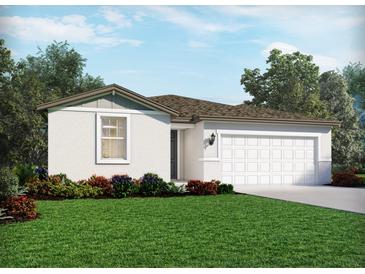 Charming one-story home featuring a two-car garage, landscaped yard, and neutral paint scheme at 2257 Sageland Way, Bartow, FL 33830