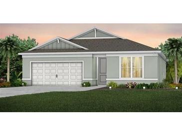 Charming single-story home with a two-car garage and neutral-colored facade and well-manicured lawn at 3095 Norcott Dr, Davenport, FL 33837