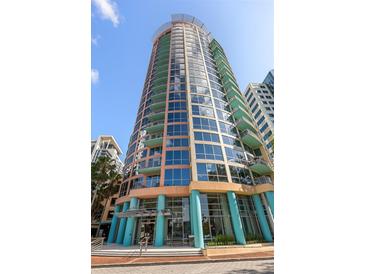 Modern high-rise building features large windows, balconies, and unique architectural details at 322 E Central Blvd # 1412, Orlando, FL 32801