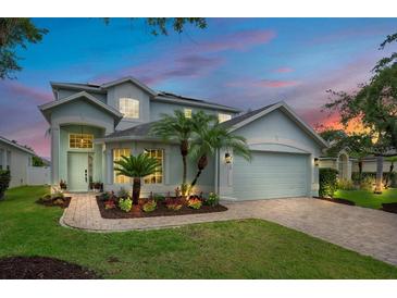 Charming two-story home with landscaped yard and a two-car garage at 912 Pickfair Ter, Lake Mary, FL 32746