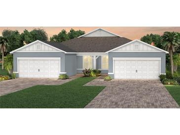 Charming single-Gathering home with a two-car garage, attractive landscaping, and a modern design at 2348 Daisy Tree Rd, St Cloud, FL 34771