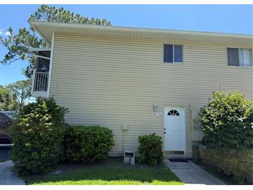 Charming condo featuring a private balcony and well-maintained landscaping at 5564 Slash Pine Ct # 4, Orlando, FL 32811