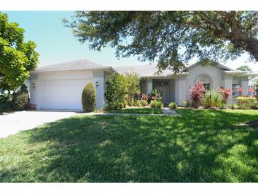 Charming one story home with mature landscaping and a two car garage at 1764 Carillon Park Dr, Oviedo, FL 32765
