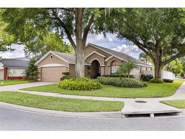 Charming single-story home with well-maintained landscaping and a two-car garage at 2737 Cahill Way, Lake Mary, FL 32746