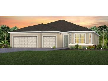 Charming home featuring a three-car garage, manicured lawn, and inviting front entrance at 5101 Rising Ridge Dr, Mount Dora, FL 32757