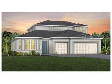 This is a gorgeous two-story home with a large front yard and an attached two-car garage at 5242 Handsome Hills Dr, Mount Dora, FL 32757