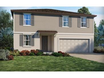 Charming two-story home featuring a two-car garage, neutral color palette, and well-maintained landscaping at 3896 Giorgio Dr, Winter Haven, FL 33884