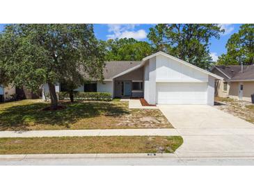 Charming single-Gathering home with well-maintained lawn and attached two-car garage at 116 Morning Glory Dr, Lake Mary, FL 32746