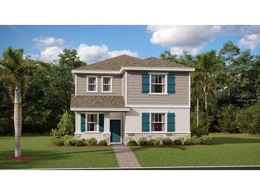 Charming two-story home featuring a modern exterior design with well-manicured landscaping and inviting entrance at 3017 Namaste Dr, Clermont, FL 34714