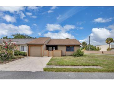 Charming single-story home features a one-car garage, tidy lawn, and inviting curb appeal at 3153 Greenwood St # Winter Spr, Winter Park, FL 32792
