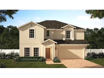 Two-story home with attached two-car garage, covered entry, manicured lawn and mulled windows at 4009 Serene Water Ave, Eustis, FL 32736