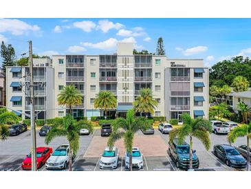 Beautiful condominium building with manicured landscaping and ample parking in a desirable location at 1100 Delaney Ave # F407, Orlando, FL 32806