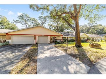 Attractive single-story home with two-car garage and landscaped yard at 8580 Sw 97Th Lane Rd # B, Ocala, FL 34481