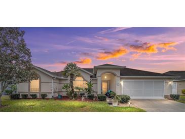 Attractive single-story home with landscaped yard and two-car garage at 5470 Nw 26Th Lane, Ocala, FL 34482