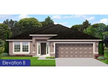 One-story home with a two-car garage and attractive curb appeal at 8797 Se 161St Pl, Summerfield, FL 34491