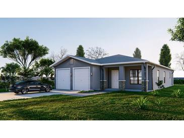 Curb appeal abounds in this 2-car garage home with stone accents at 1336 40Th St, Orlando, FL 32839