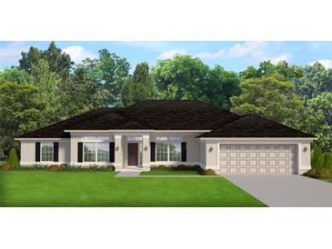 Charming single-story home with manicured lawn, symmetrical windows, and attached two car garage at 2 Dogwood Crse, Ocala, FL 34472